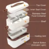 c511b6d7518fe2599cef107bd80ca40b.webp Portable Electric Lunch Box Heating Double Layer Stainless Mini Rice Cooker Heating Meal Lunchbox
